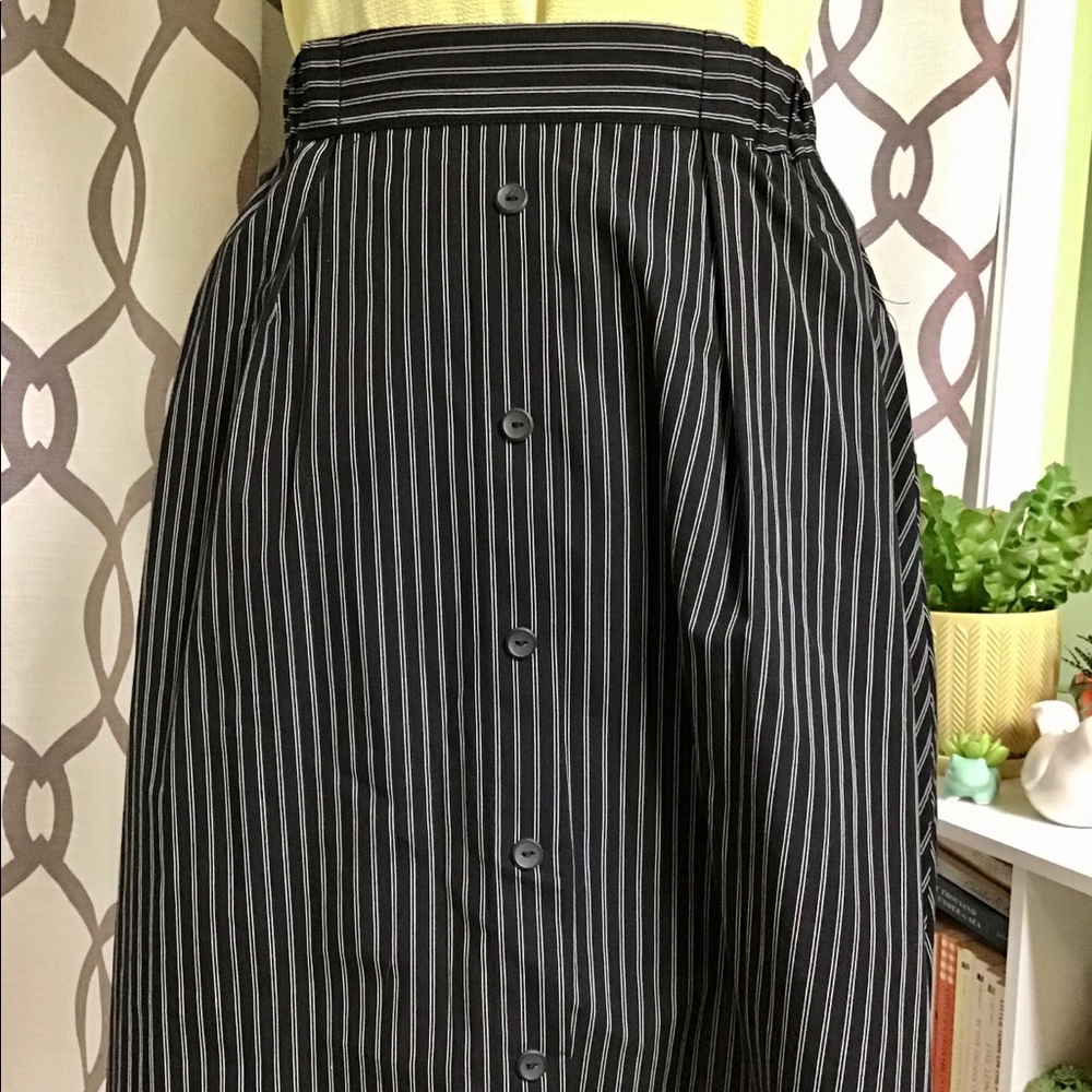 Black A-line skirt with vertical white stripes
